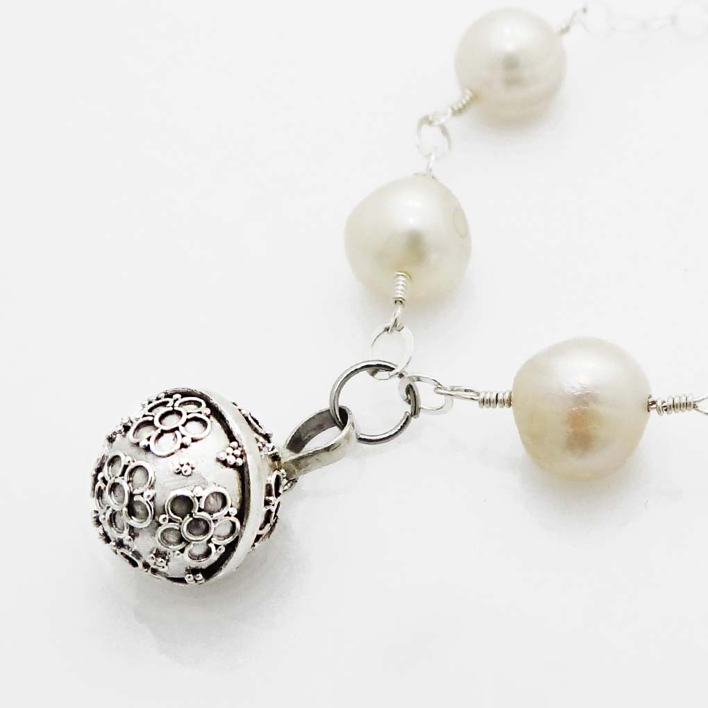 Pulsera Perla Natural y Llamador de Ángeles